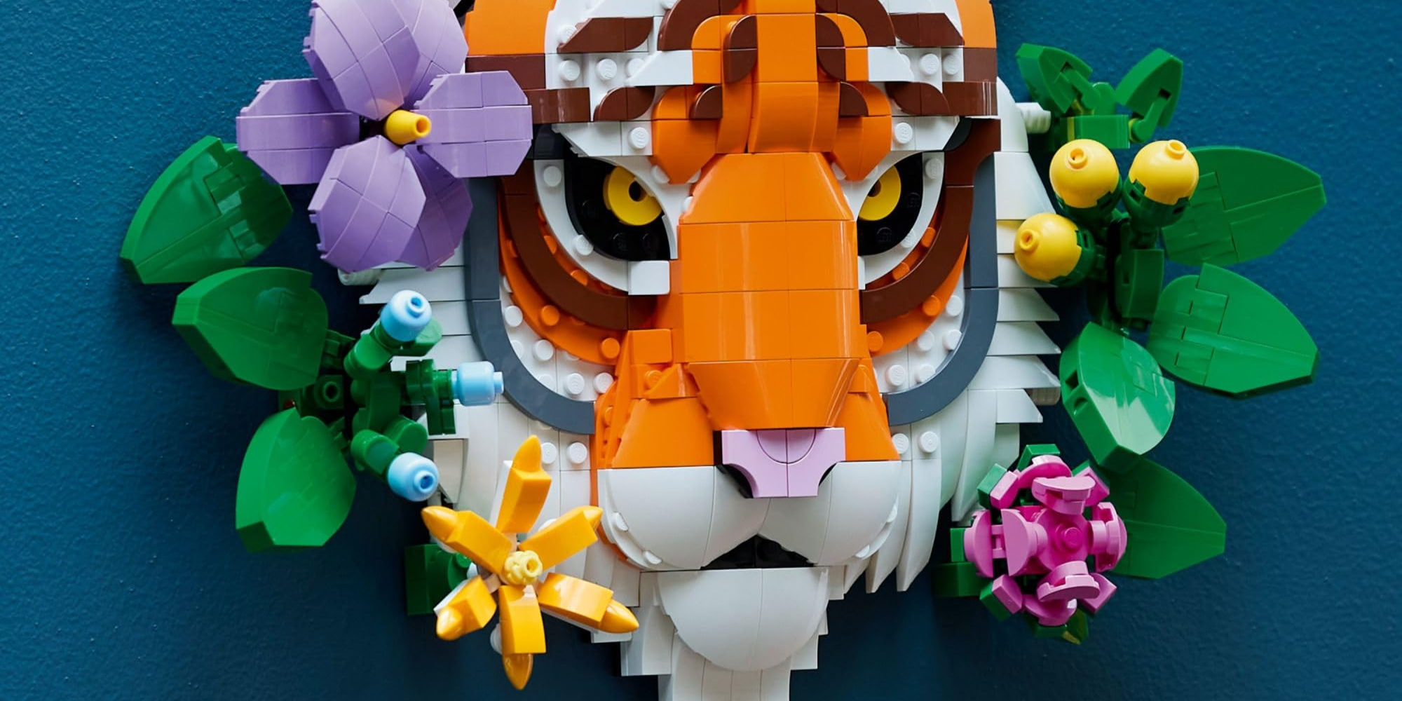 Turn boring, blank wall space into a jungle oasis with LEGO’s Art Tiger set down at $42