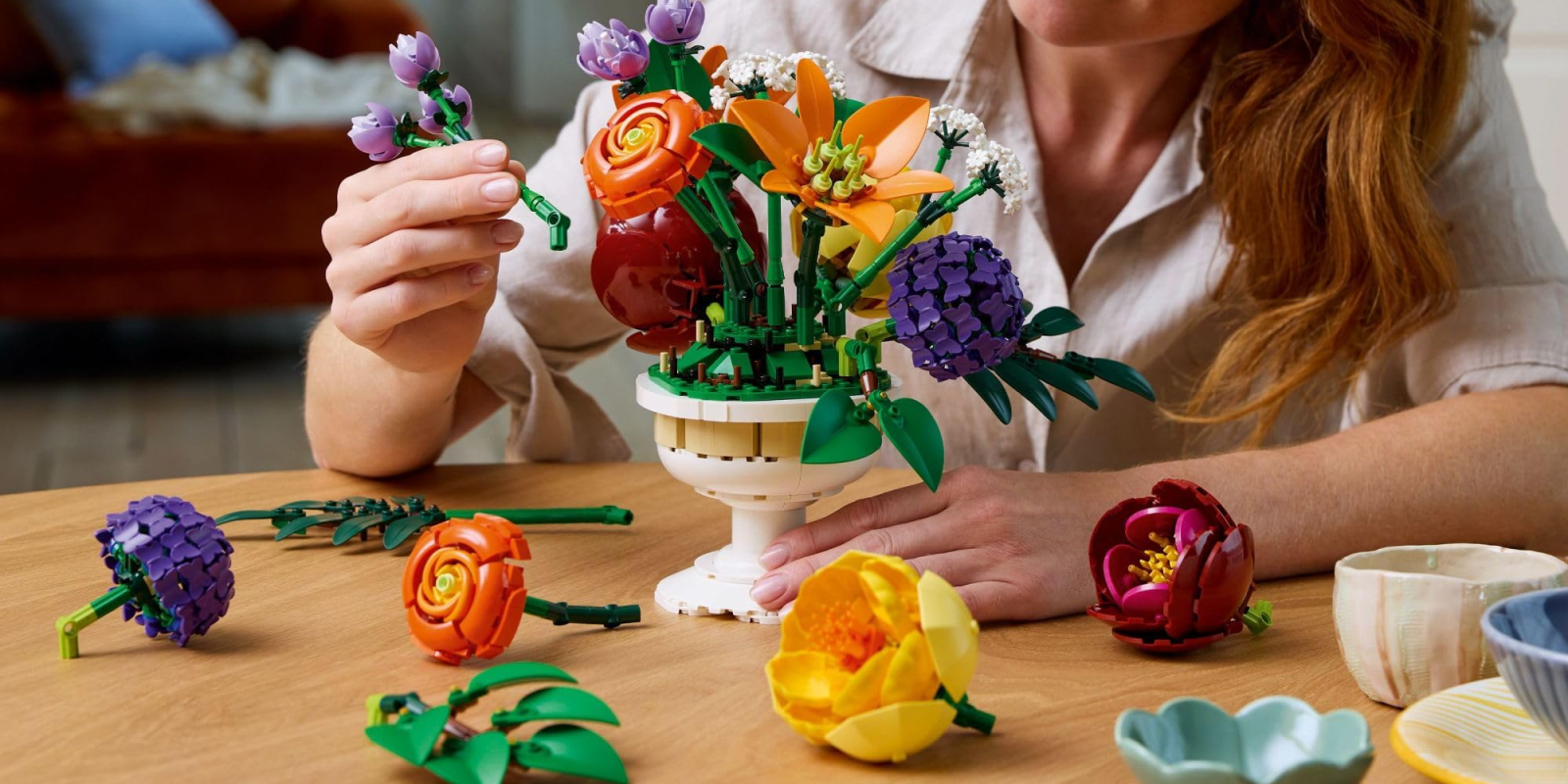 A woman making a flower arrangement