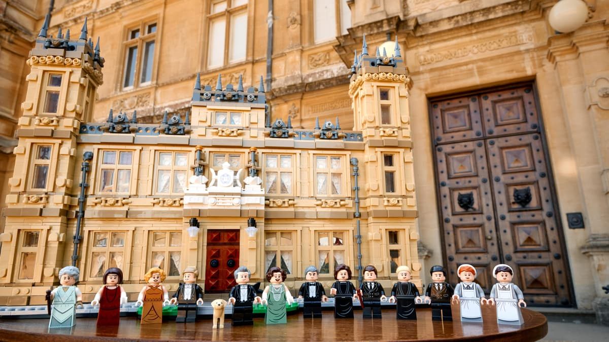A group of people next to a building