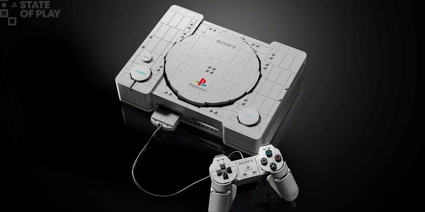 A white gaming console with a controller