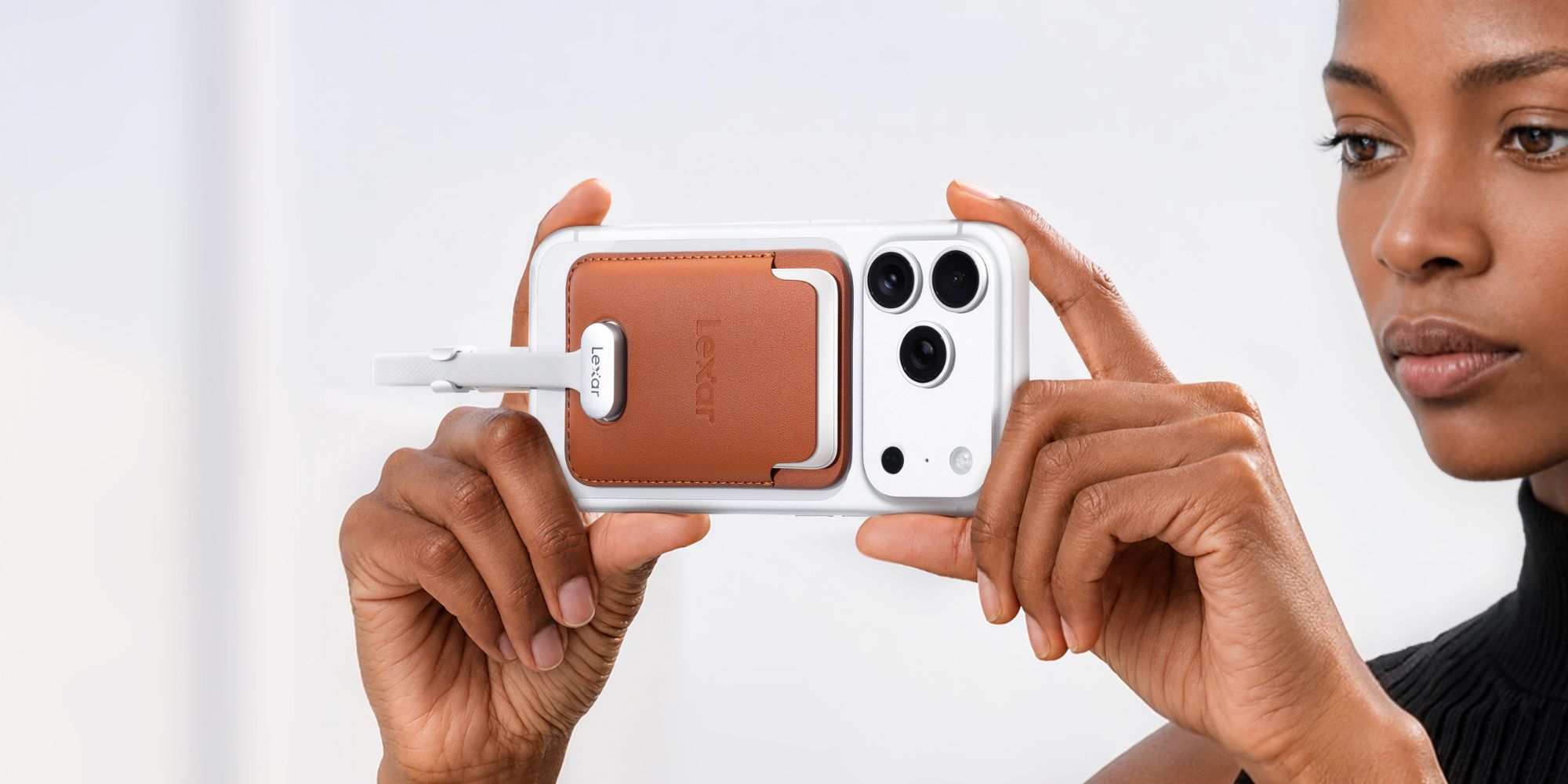 Hands holding a cell phone