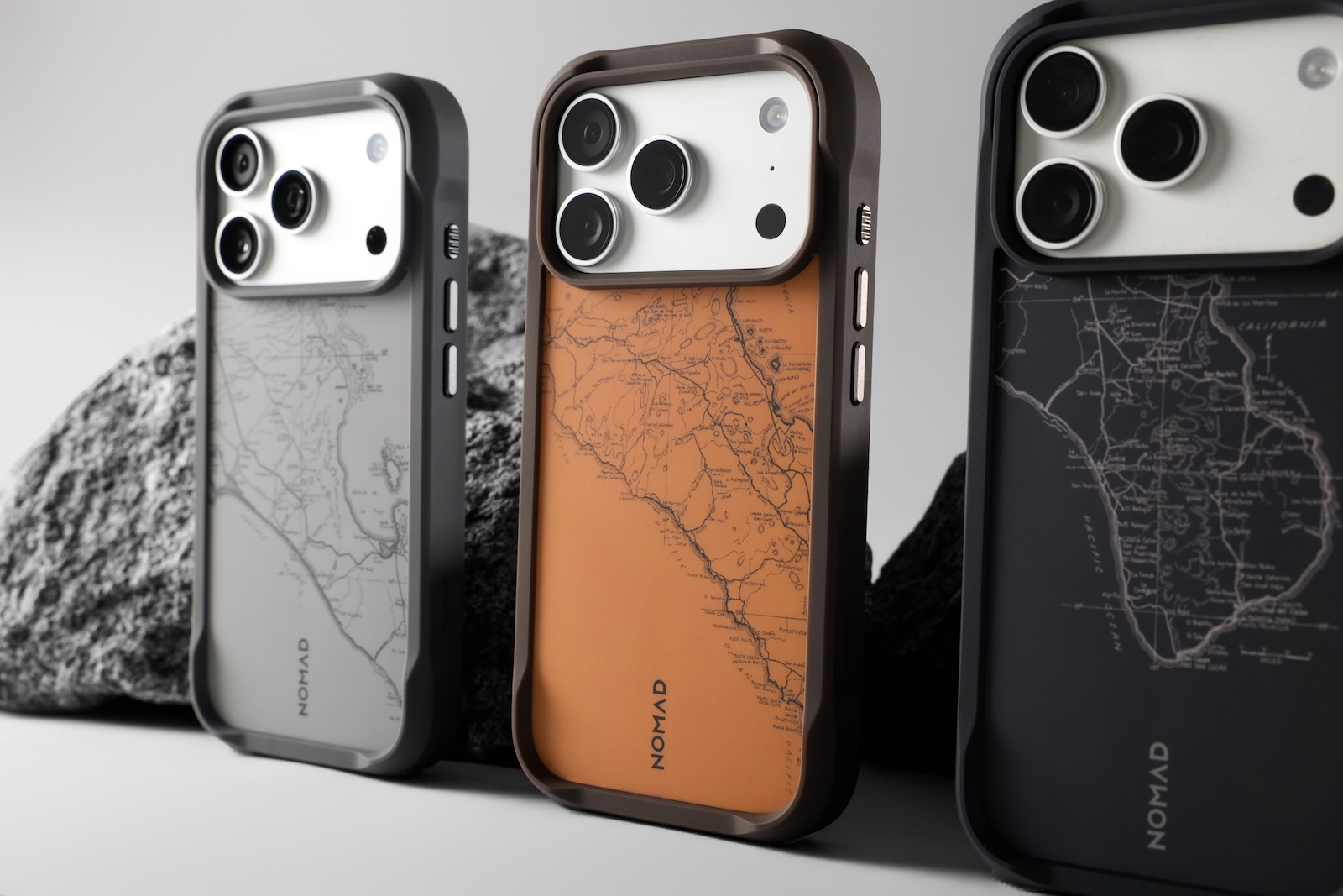 A group of cell phones with a map on them