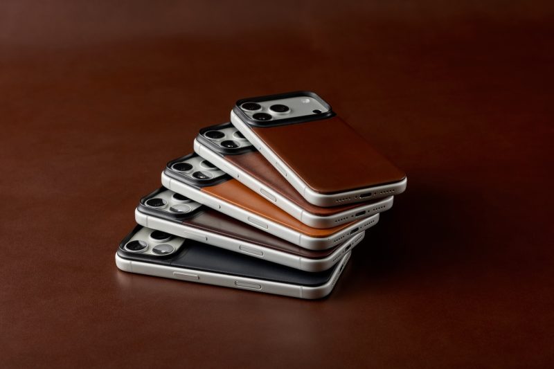 A group of cell phones stacked on top of each other