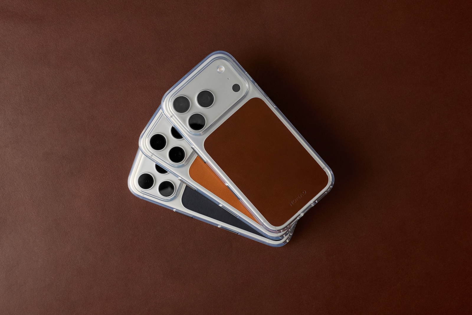 A group of cell phones stacked on top of each other
