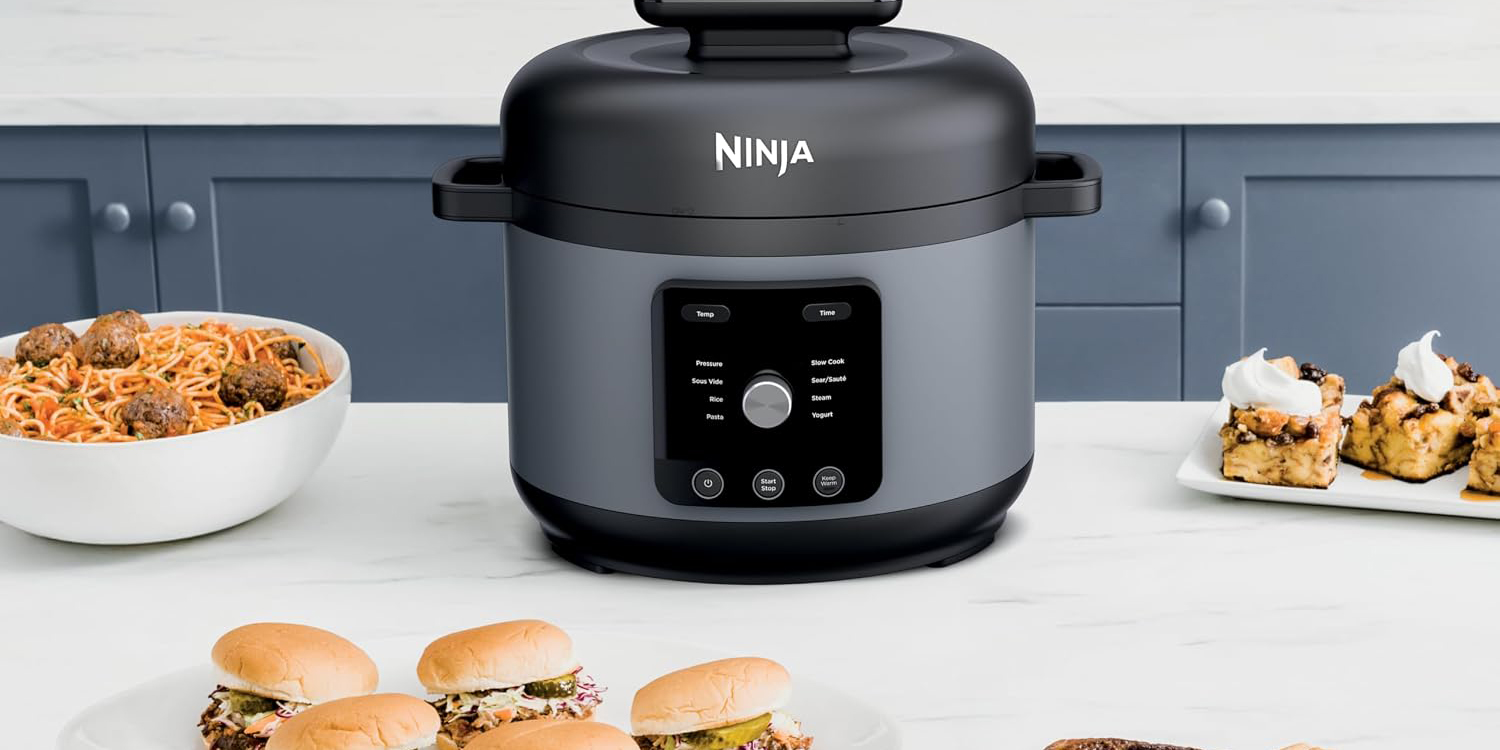 A black and grey electric pressure cooker