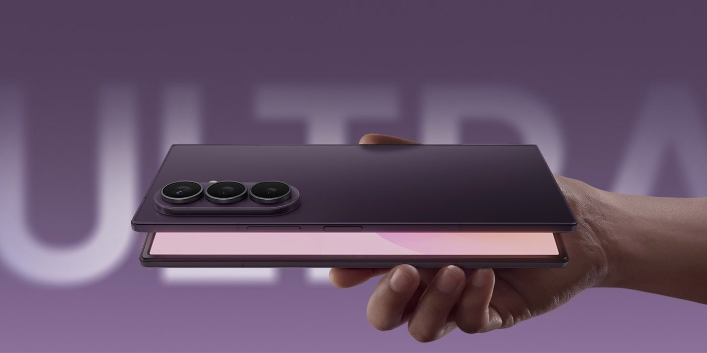 A hand holding a cell phone