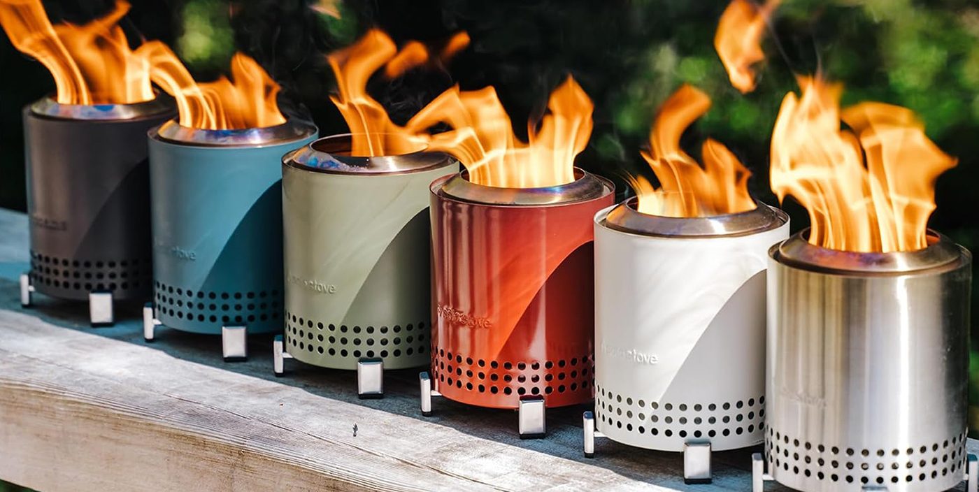 A group of fire containers on a wood surface