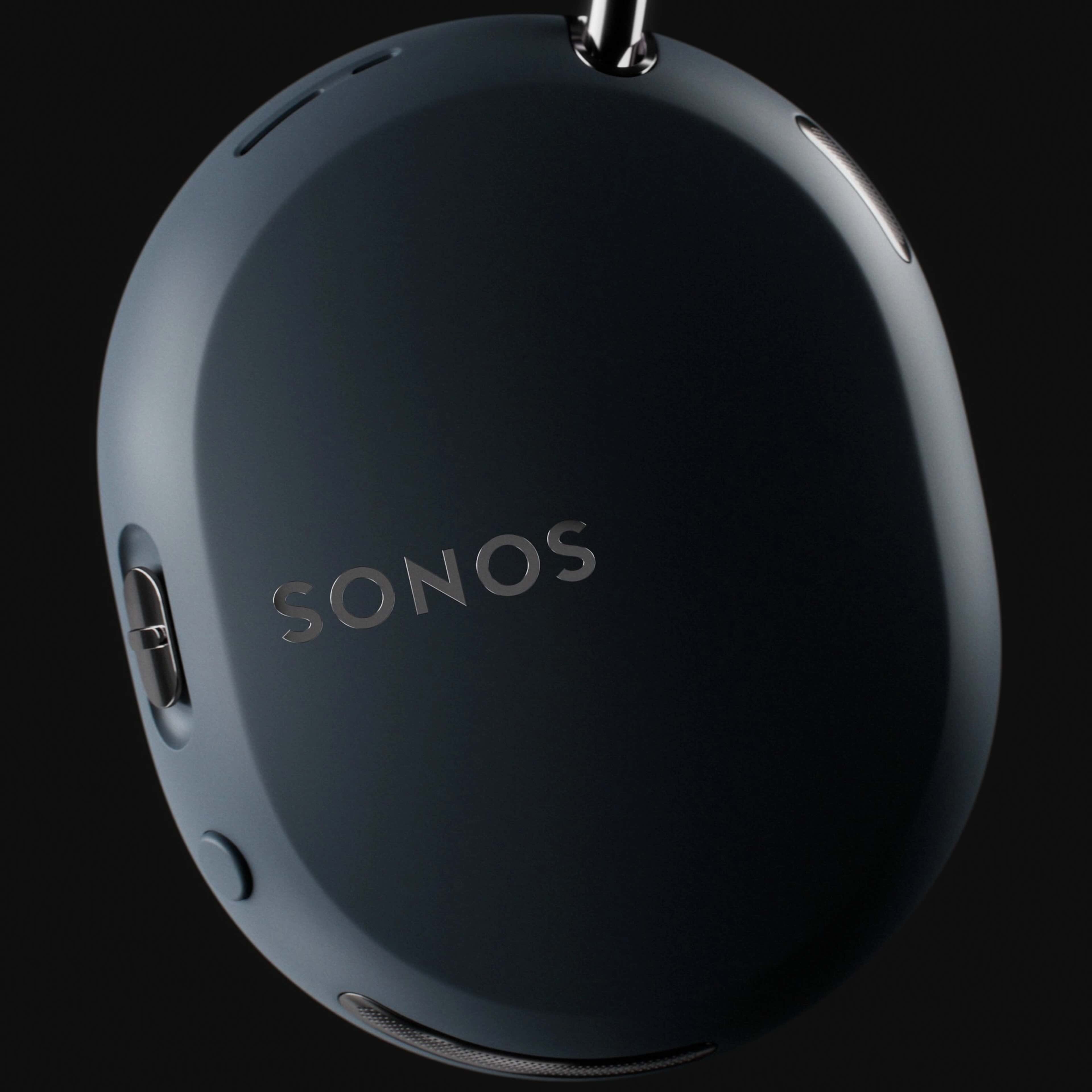 A round black object with a metal handle