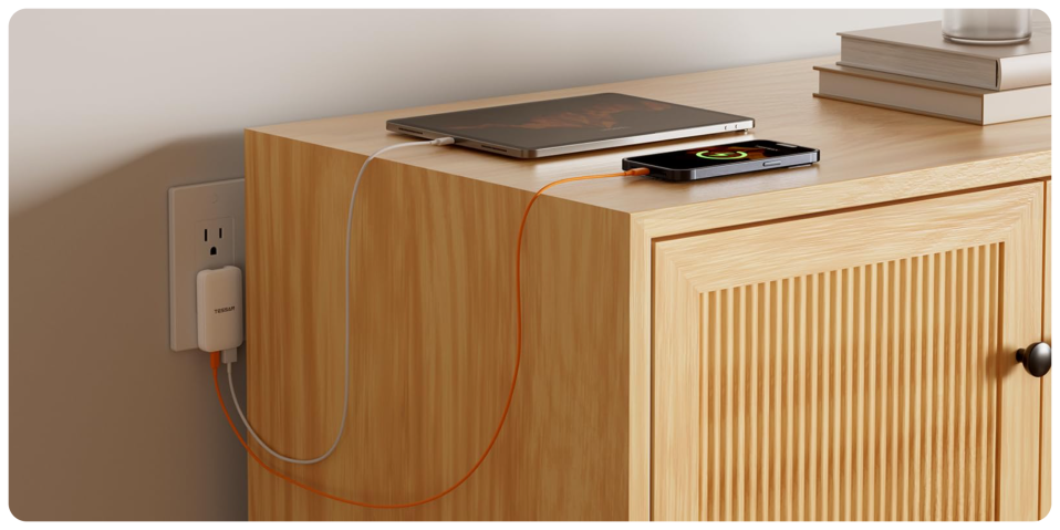 A cell phone and a tablet on a cabinet