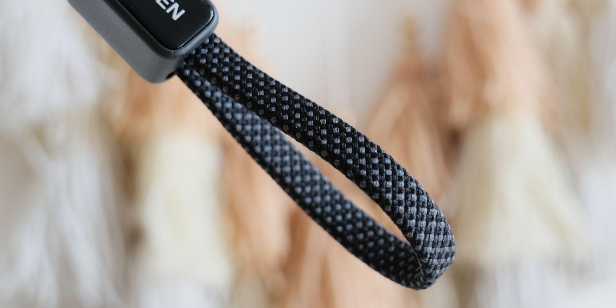 A close up of a black cord