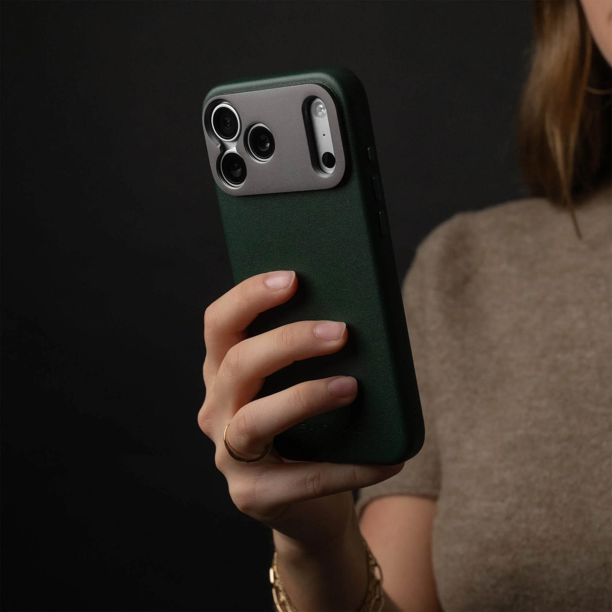 A woman holding a cell phone