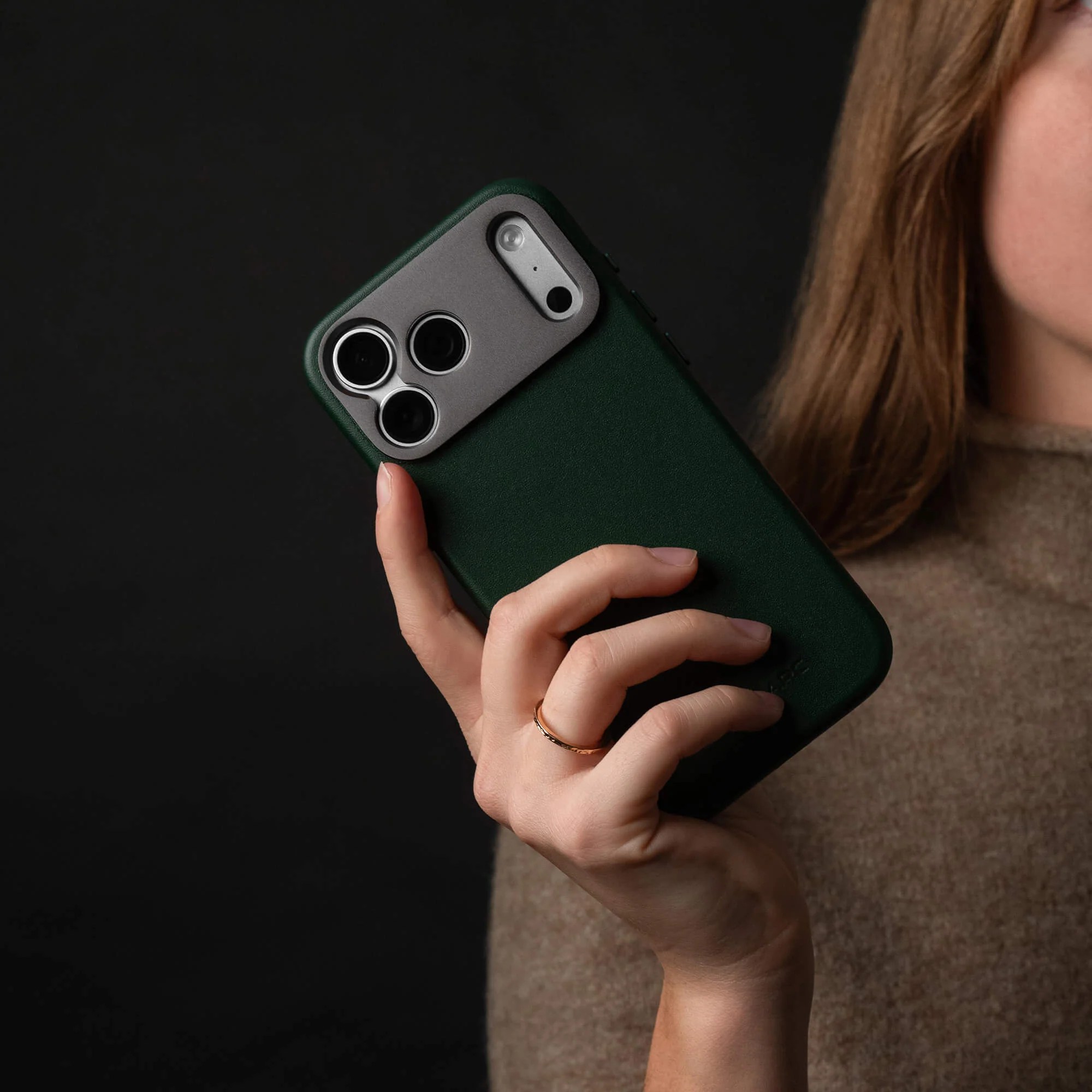 A woman holding a phone