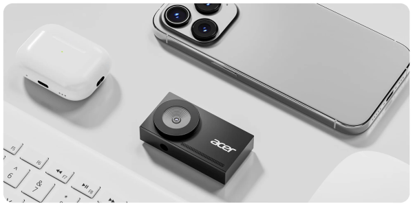 A camera and a phone on a table