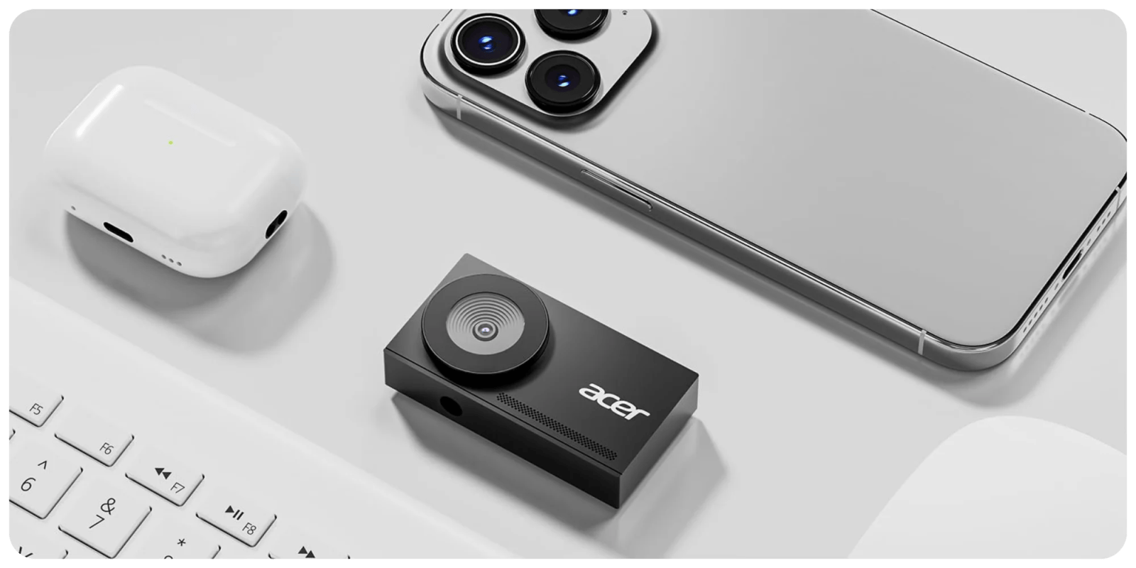A camera and a phone on a table