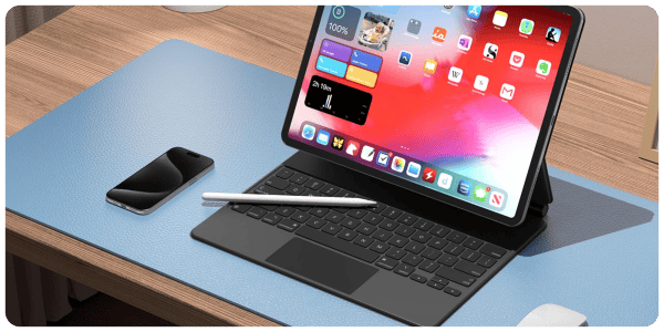 A laptop and a stylus on a desk