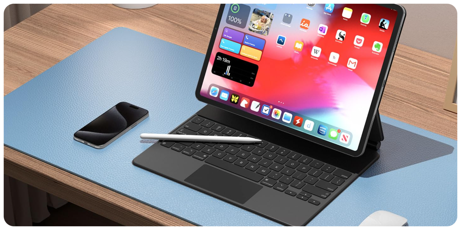 A laptop and a stylus on a desk
