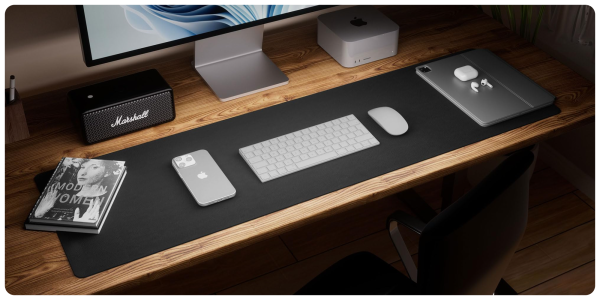 A desk with a computer and a keyboard and a mouse