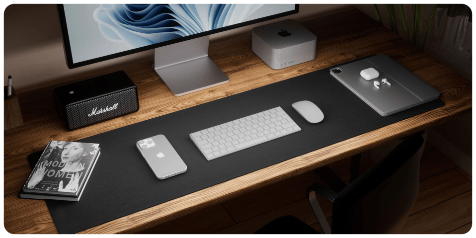 A desk with a computer and a keyboard and mouse