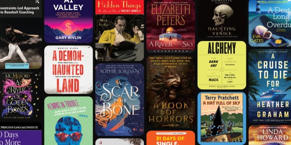 A collection of books on a black background