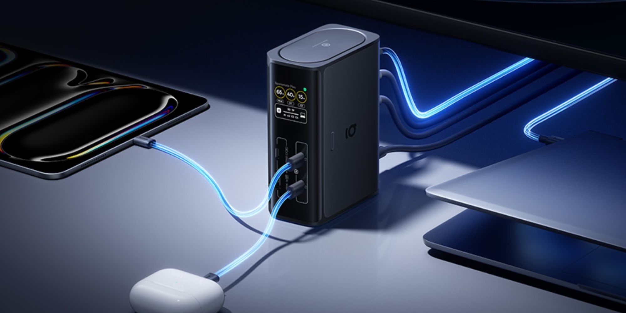 A black box with blue wires connected to a white mouse