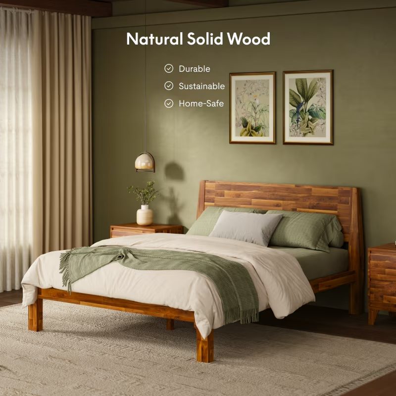 A bed with a wood bed frame