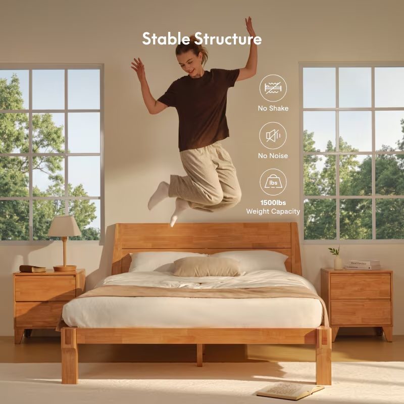 A woman jumping on a bed