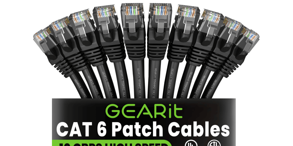 A group of black cables with green and white text