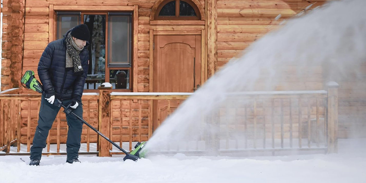 A person using a snow blower