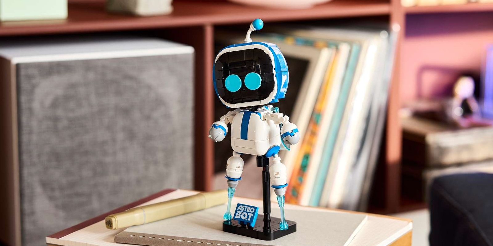 A toy robot on a book