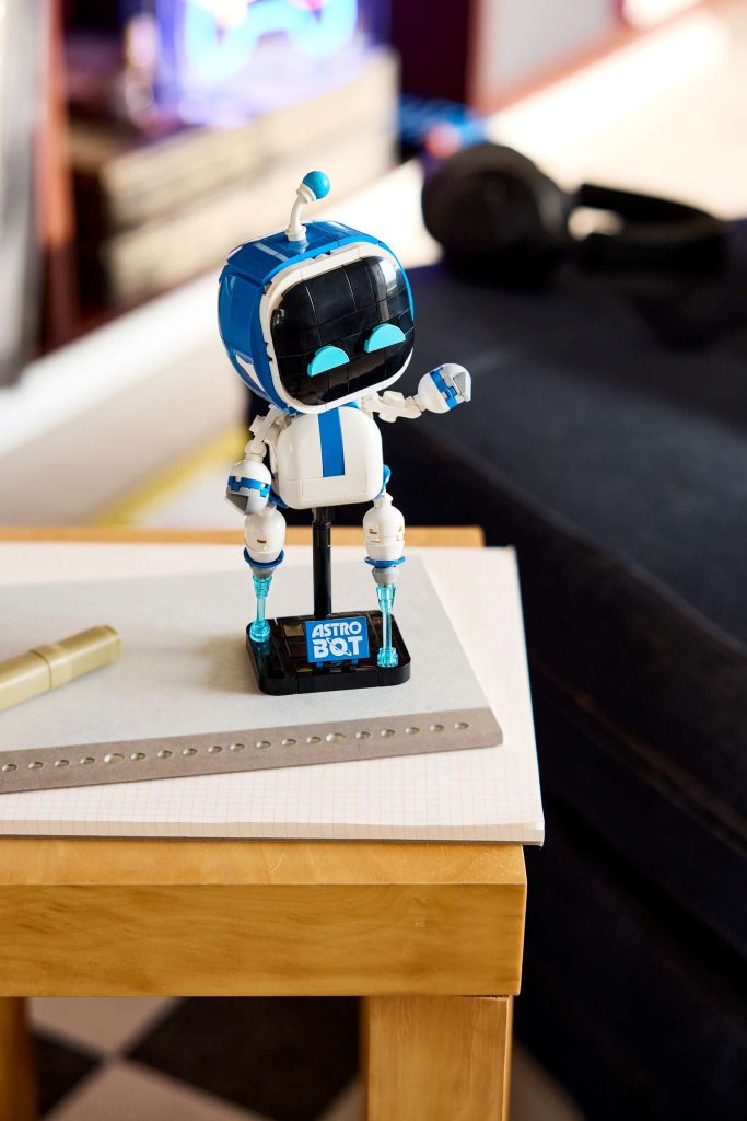 A toy robot on a desk