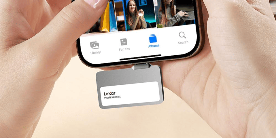 A hand holding a phone