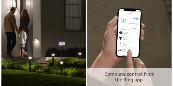 A person holding a phone with a ring system on it