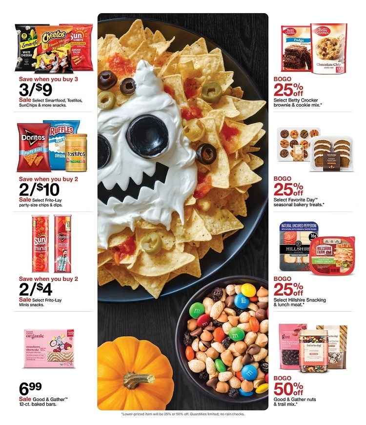 A black plate with food on it and a pumpkin on it