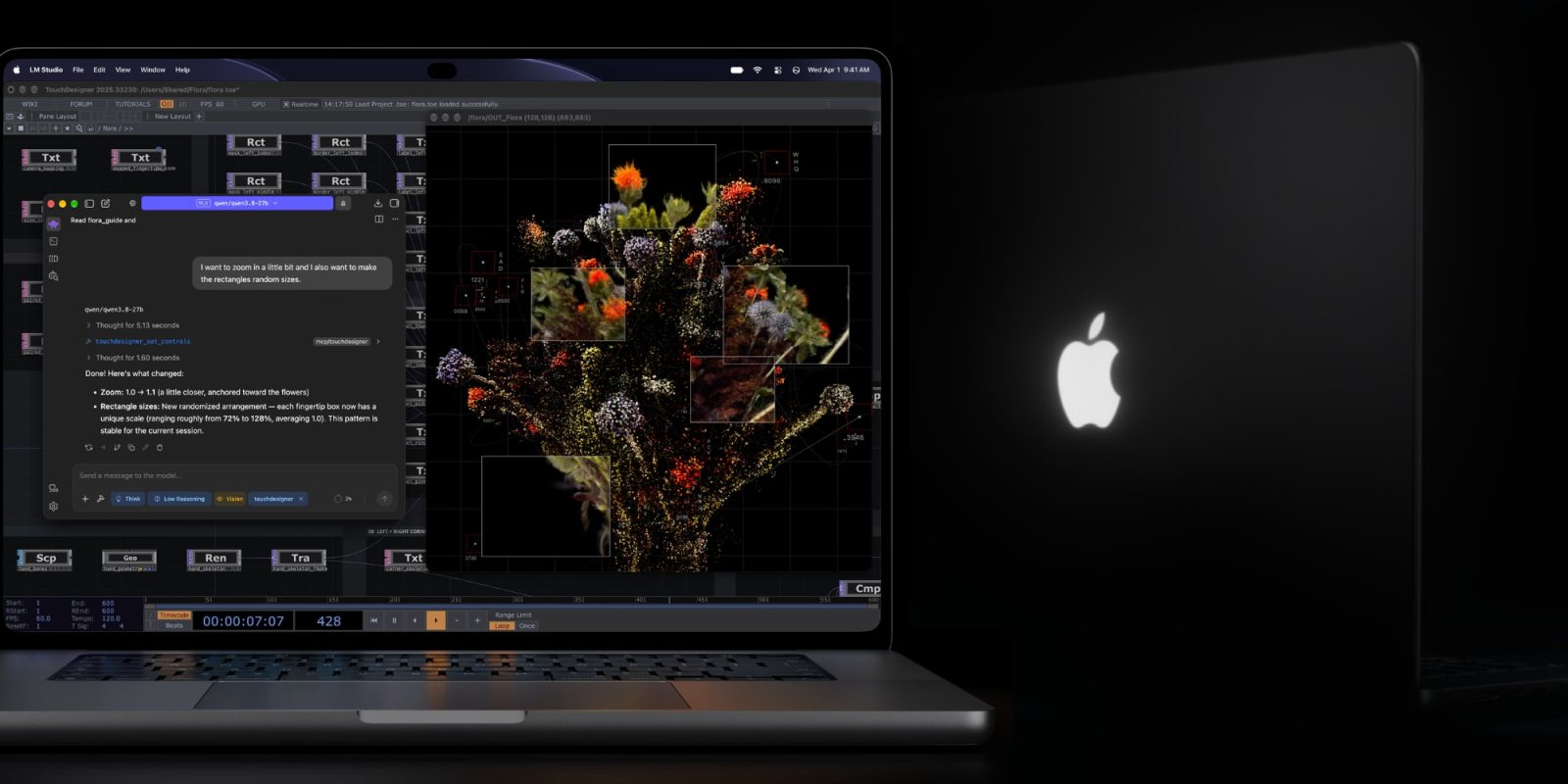 A laptop with a flower arrangement on the screen