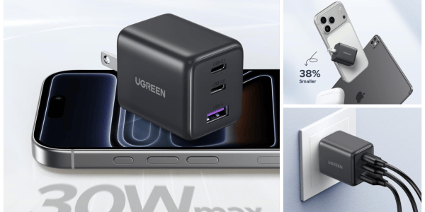 A black cube with usb ports on a cellphone